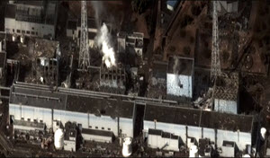 Image on 16 March 2011 (8 years ago) of the four damaged reactor buildings. From left to right: Unit 4, 3, 2, and 1. Hydrogen-air explosions occurred in Unit 1, 3, and 4, causing structural damage. A vent in Unit 2's wall, with water vapor/